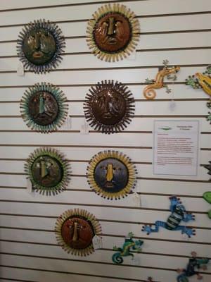 Sun Faces made with steel drums.