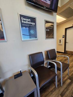 Outlets for plugs and USB cords, and TV for news