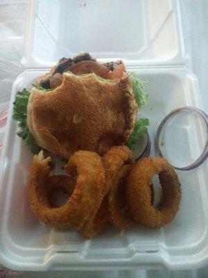 McKenna's Burger with onion ring. This is about as much as I could eat of the burger before I had to stop treating my taste buds so badly.