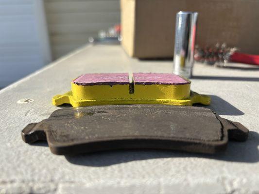 The difference between a new pad, and what was used on the inside rear rotors.