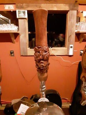 Tap handle for "Drums & Roses IPA." Hand carved!