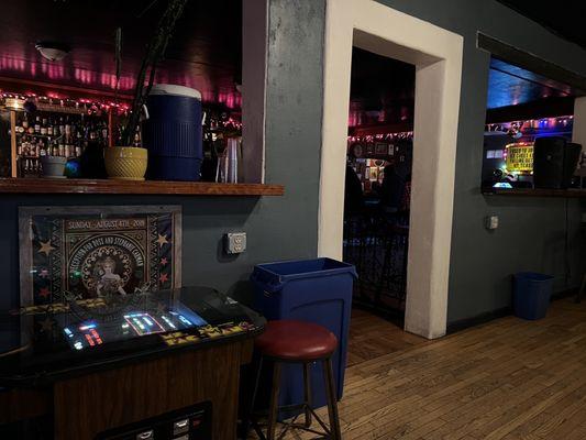 Pack man and entry to bar from pool area