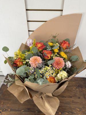 A deluxe seasonal wrap with a warm spring color palette!