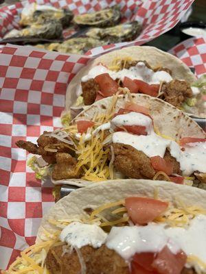Bayou gator, tacos, and three cheese, baked oysters