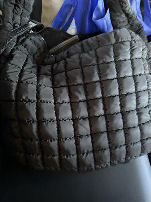 My returned purse I left on the shuttle to LAX.