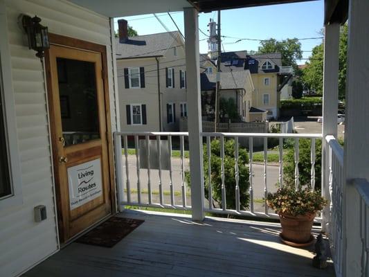 The main door is on the back side of the building