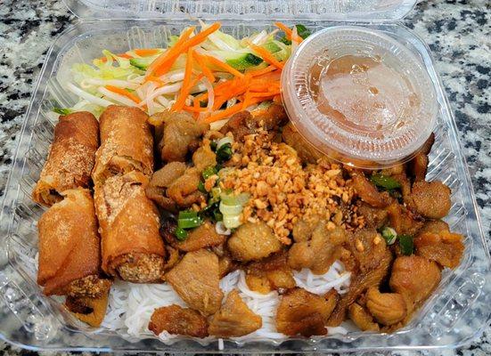 Pork and egg roll vermicelli noodle bowl with fish sauce