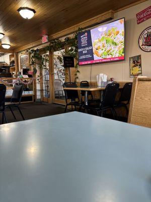 Entry way. Warm and inviting. Country music playing.