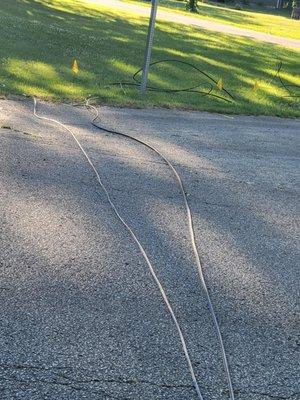 Cable lines in road.