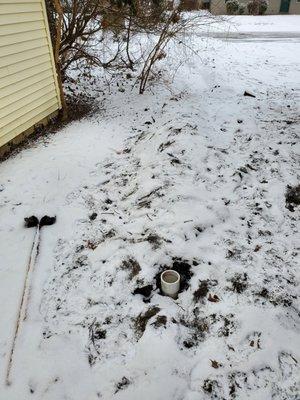 This is how they left when the work was completed; left their shovel, left my pipes opened up, and just vanished without any actual fix.