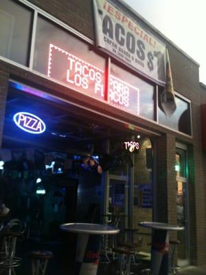 The front with its garage door open.