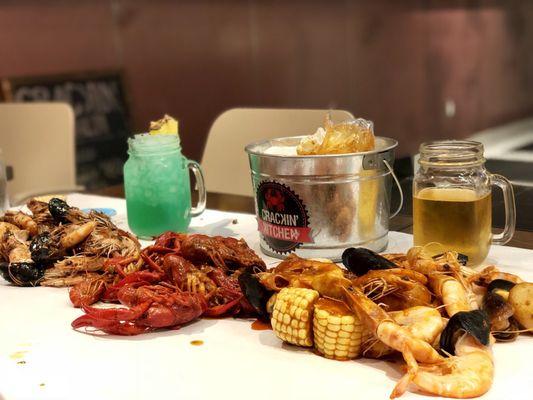 Shrimp Seafood $40/split half tossed in Black Sauce-Mild & Red Sauce-XXX. Bomb!