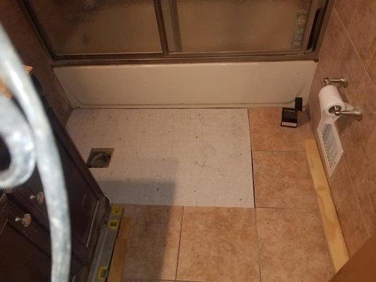 although this floor was a mud job, I had to stack 3/4 plywood 3 sheets thick and top it off with 1/4 hardibacker to patch this section.