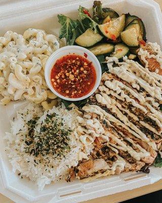 Seared ahi lunch special with kimchi cucumbers, Mac salad, and white rice topped with furikake
