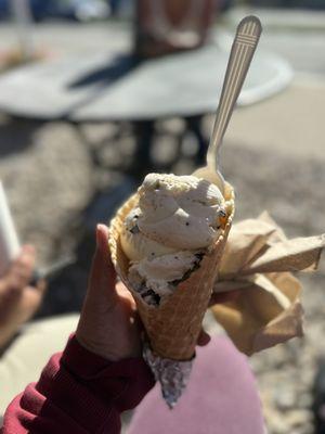 Waffle cone with chocolate chip vanilla and salted caramel ice cream