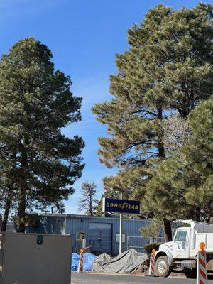 Good year is adjacent to pipewood storage sign