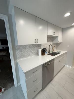 New cabinet and backsplas