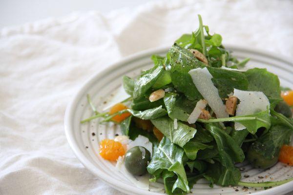 arugula salad with navel oranges, castelvetrano almonds + shaved pecorino