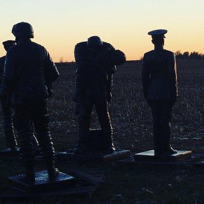 Concrete military statues representing the US Marines, US Army, US Airforce, US Coast Guard, US Navy