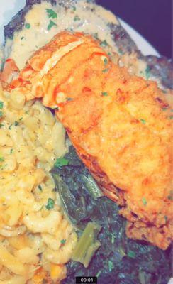 Surf & Turf: Ribeye, crab on top of steak, fried lobster tail, turkey collards & krack n cheese.