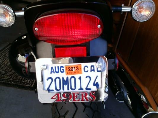 Custom license plate frame for a harley davidson.