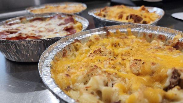 Scratch Made Mac and Cheese , all of our sauces and proteins made fresh .