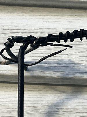 Broke /Ripped down the cable line and put it back up with a twist tie