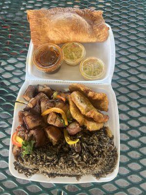Black rice, plantain, beef or pork, smoked herring patty.