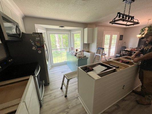 Before countertops wall gone flooring patched