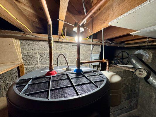 Heater, copper pipes, expansion tank, and electrical distribution box