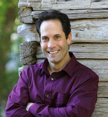 Dr. Christopher J. Holland