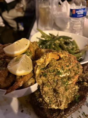 Crab ribeye green beans and garlic noodles.