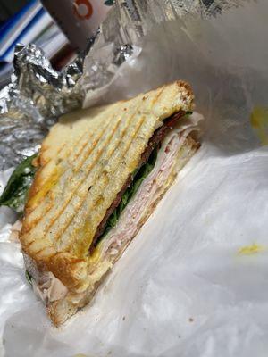 half of the Smoked Pepper Jack Turkey Panini