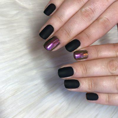 Matte black with chrome accent nail . Gel manicure