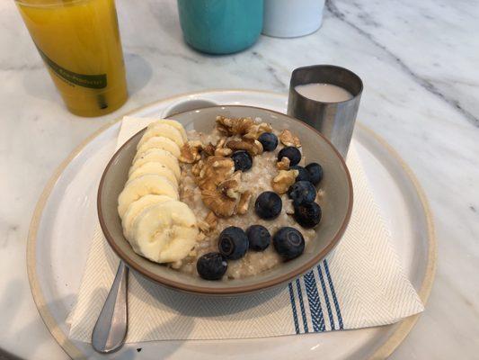Oatmeal - blueberries, cinnamon, toasted walnuts, banana, brown sugar and milk.
