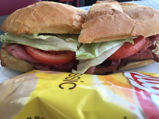6/14/16 Atomic Sub: 9 inch. Ham, salami, roast beef, chopped salad olives, onions, bell pepper, lettuce, tomato, mustard. And chips!