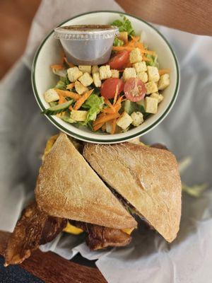 Turkey, bacon, and ranch with a side salad