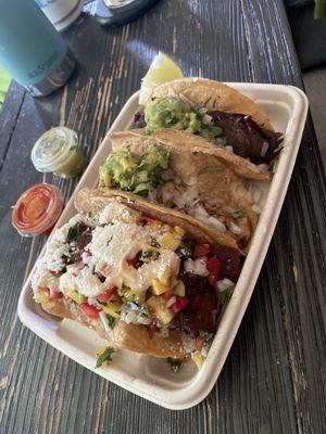 Fish, chicken, and brisket taco -Mexican style