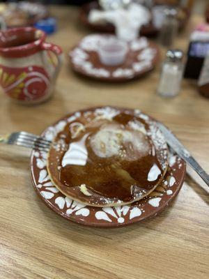 Pancake with butter and syrup