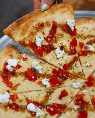 June Pie of the Month: Truffle Goat Cheese Pizza with fontina, truffle goat cheese, fig jam, Mama Lil's peppers and chive