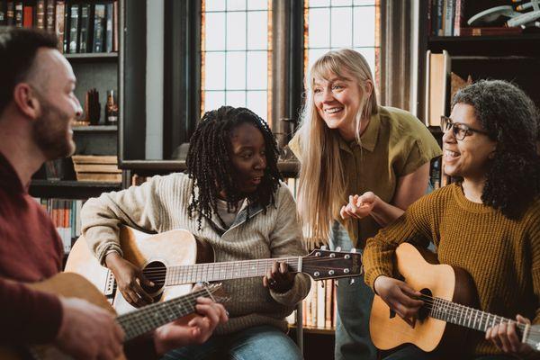 Join a guitar skills and songwriting course