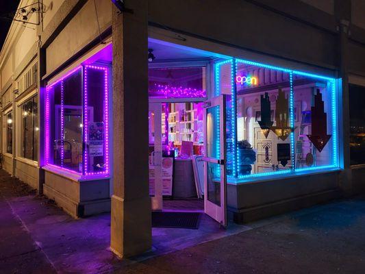 We're only open till six except on special occassions but if you drive by at night...