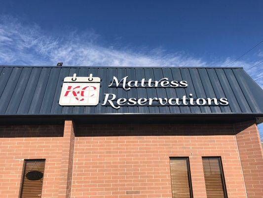 KC Mattress Reservations sign.