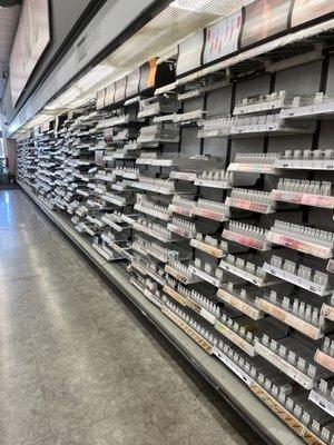 Bare shelves in the middle of the day on a Saturday. It's like this all the time - ghetto AF