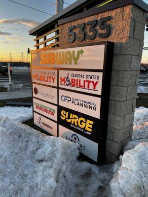 Look for the Surge logo on the sign at the SE corner of Merle Hay and Johnston Drive.