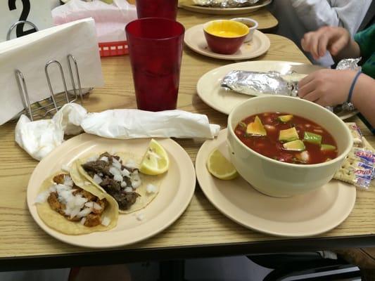 Two street tacos and medium shrimp cocktail.