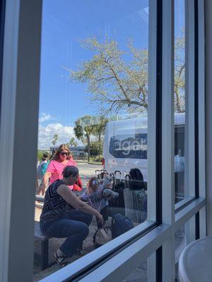 Not enough space for everyone to wait inside.