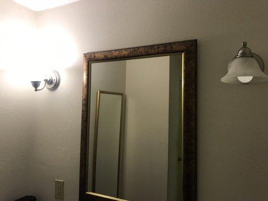 This is the bathroom vanity with only one good bulb