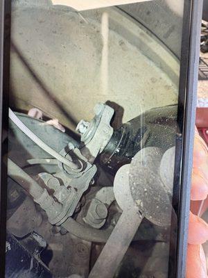 loose bolts holding up rear upper control arm