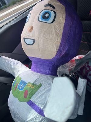 Funny buzz light year piñata.